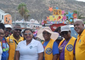 Lions distribute sunshades and earplugs during Children’s Parade