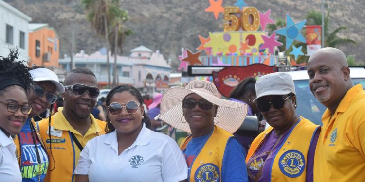 Lions distribute sunshades and earplugs during Children’s Parade