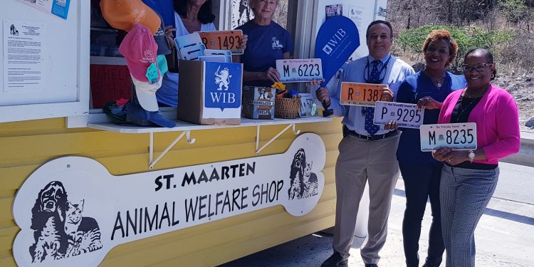 “WIB Staff donates over 60 license plates to St. Maarten Animal Welfare Foundation”