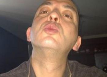 Fugitive denies putting crime writer on hit list