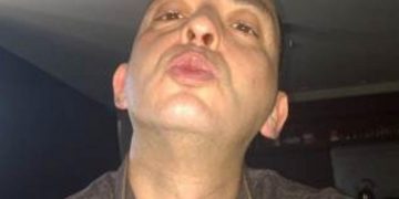 Fugitive denies putting crime writer on hit list