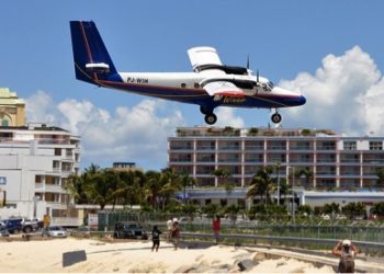 Passenger accidentally open emergency door