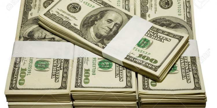 Dollar hits two-week high as traders eye Fed meeting