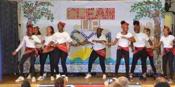 The beach, pond and dump speak  at LU’s St. Maarten Day assembly