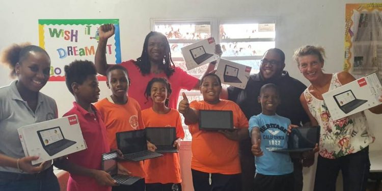 Foresee Foundation acknowledging Excellence Learning Academy with 25 tablet DigiKidz donation