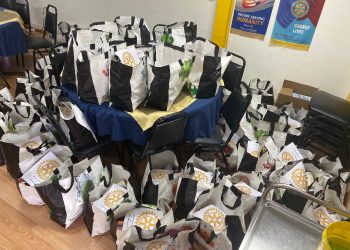 Rotarians Deliver Holiday Cheer To Those in Need