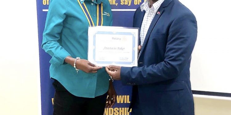 Former COCI Director presented at Rotary Sunset general meeting