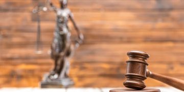 Athletics coach claims innocence in abuse case involving 4 students; Two-year sentence demanded