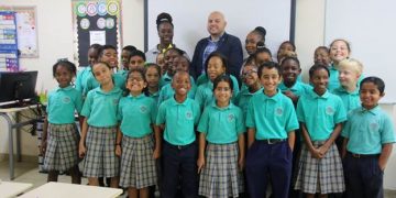 The minister of VROMI, Christopher Wever visits St. Dominic primary school