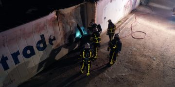 Fire in a container in sucker garden