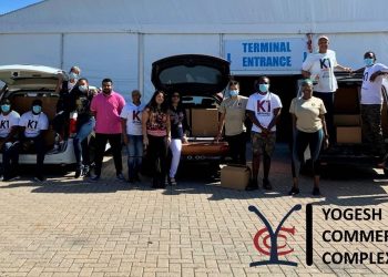 Yogesh Commercial Complex donates food boxes to those in need.