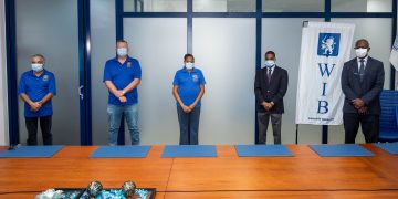 The Windward Islands Banks donates NAF 110,000.00 to the Rotary Club of Sint Maarten to assist with its food program