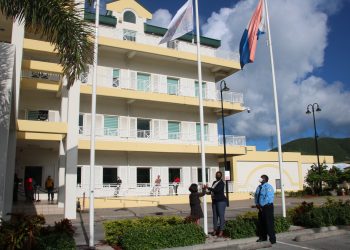 Prime Minister Silveria E. Jacobs raises the SDG flag