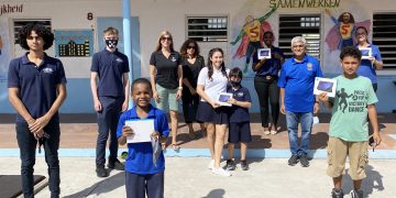 The Rotary Club of Sint Maarten’s Interact Club of Learning Unlimited Donates Tablets to School Children in Need