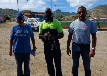 Community officers with together with a community partner assisted coach Tom at the Little League Stadium