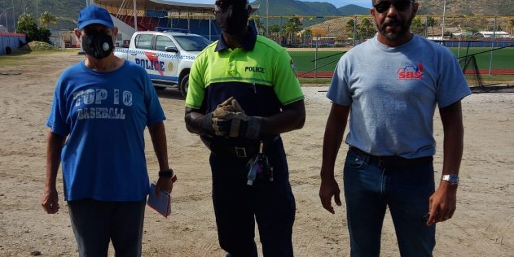 Community officers with together with a community partner assisted coach Tom at the Little League Stadium