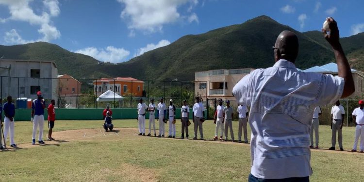 Minister Samuel delivers the game two opening pitch