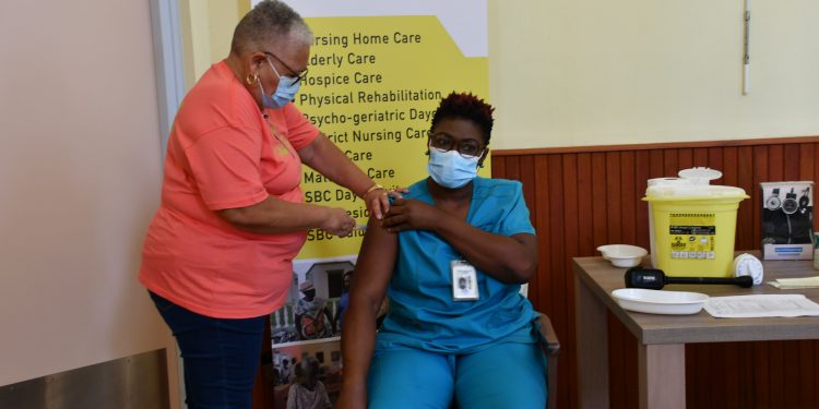 WYCCF Quality Nurse Claudette Rijff receives first COVID-19 vaccine on Monday