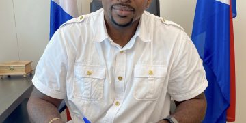 Minister Ottley signs bilateral agreement for food assistance program on behalf of the COM