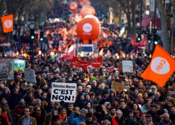 French unions remain defiant in face of proposed pension reform depsite dip in protester numbers